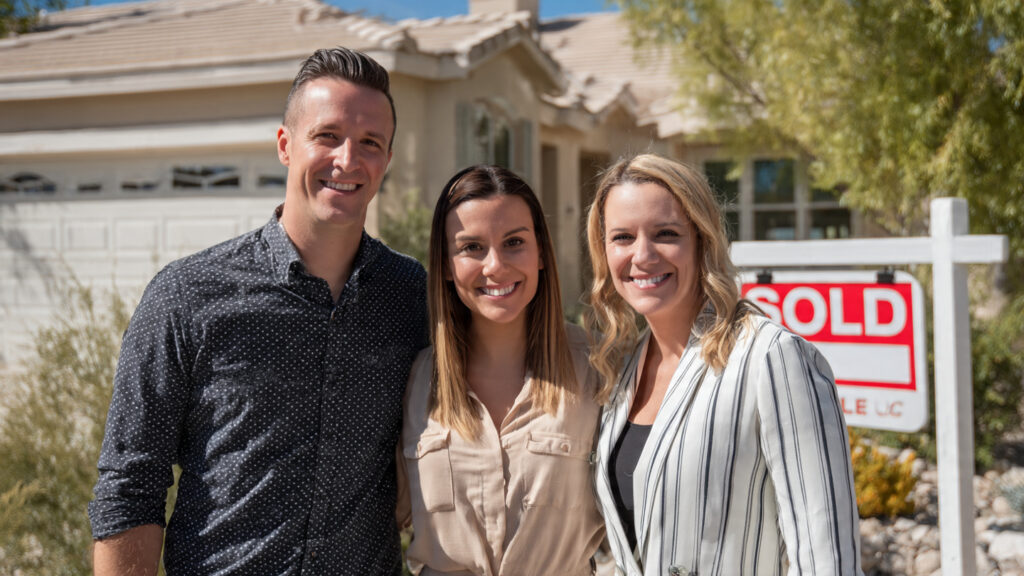 Towanda Thompson-Rosales Las Vegas realtor with happy home buyers in front of sold home in Summerlin